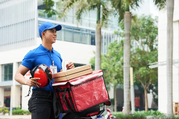 depositphotos_182946200-stock-photo-asian-young-man-delivering-pizza